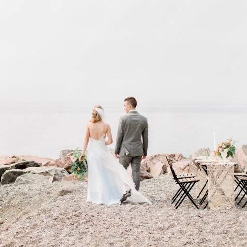 bride-and-groom-walk-the-beach